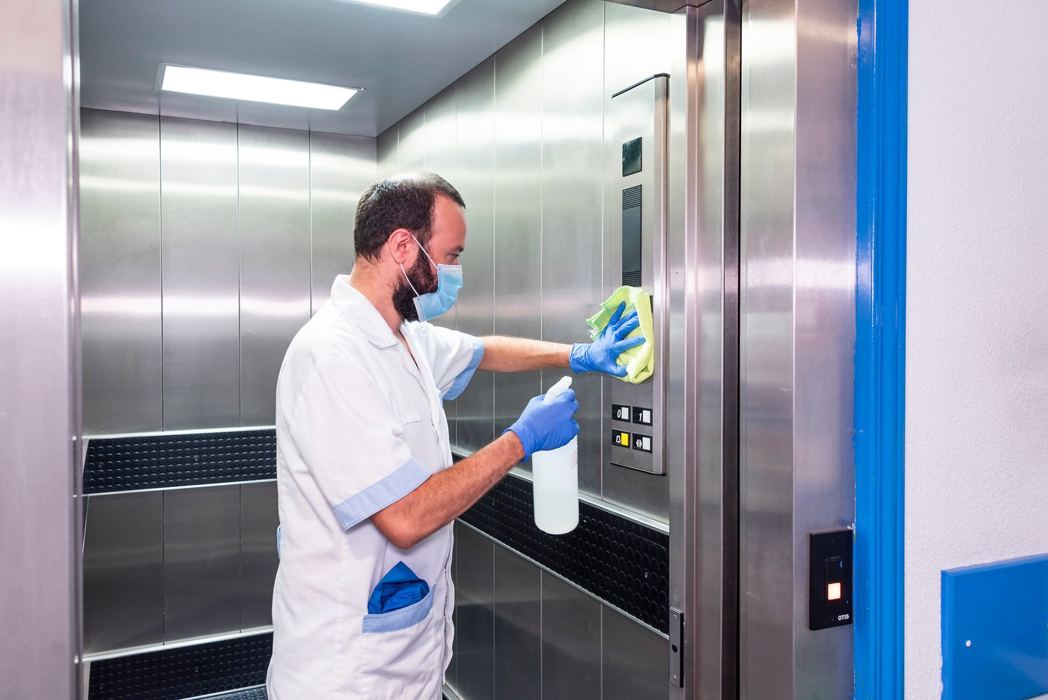 cleaning staff performing disinfection and hygiene work in hospital facilities